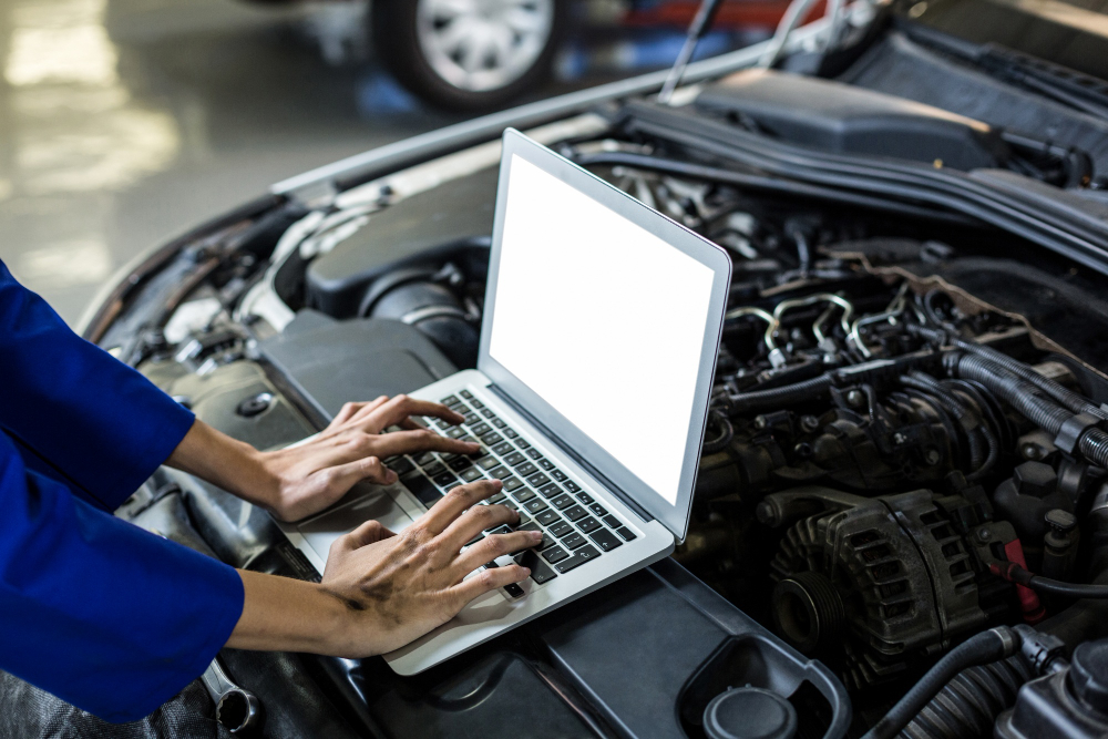 Technician reviewing an engine diagnostic scan